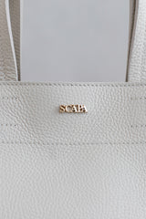 TEXTURED LEATHER HANDBAG - IVORY